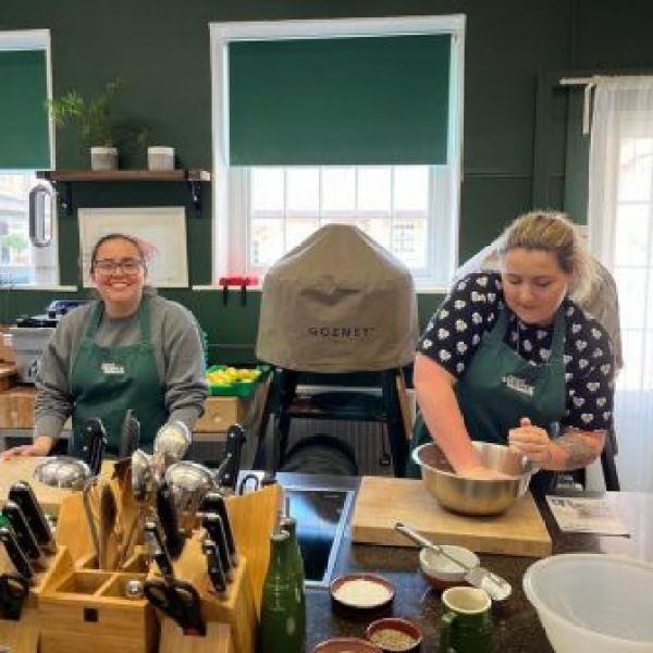 a group of people on a kitchen