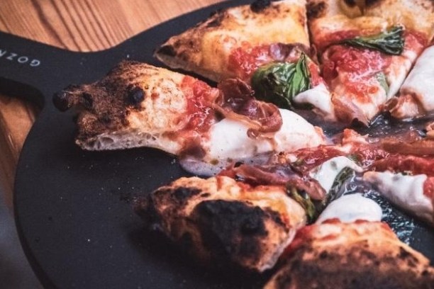 a close up of a slice of pizza