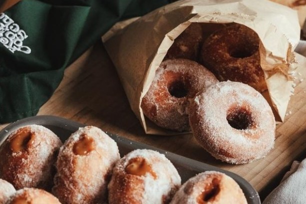 a close up of a bag of donuts