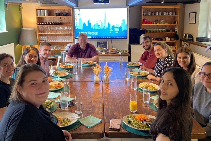 a group of people sitting at a table