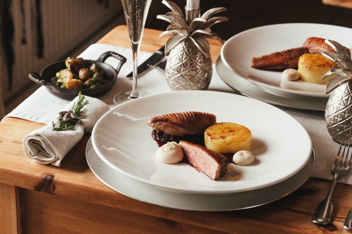 a table topped with plates of food on a plate